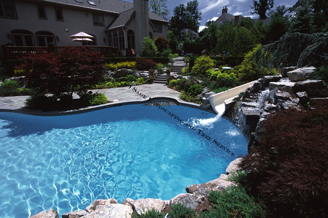 Swimming pool construction with waterslide